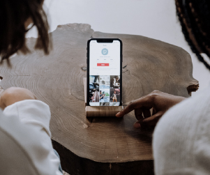 Two people scrolling on TikTok