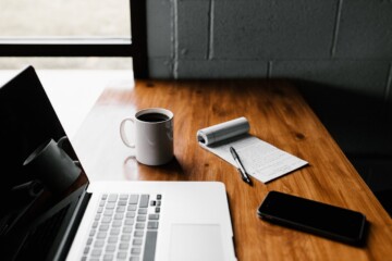 Notebook, coffee, computer, phone