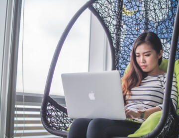 woman-in-chair-working-on-computer