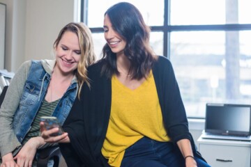 Women laughing at work