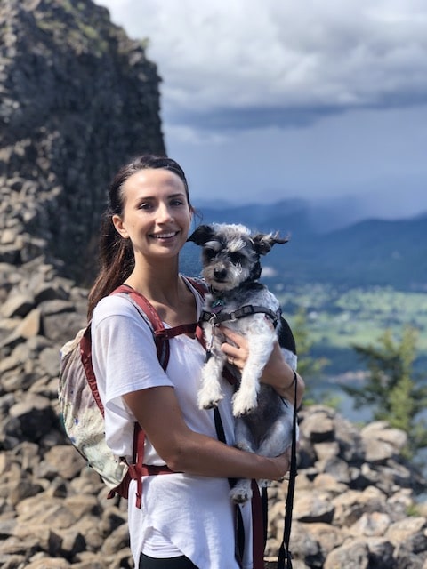 woman holding a dog
