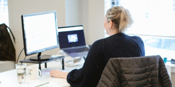 Woman working on computer in office