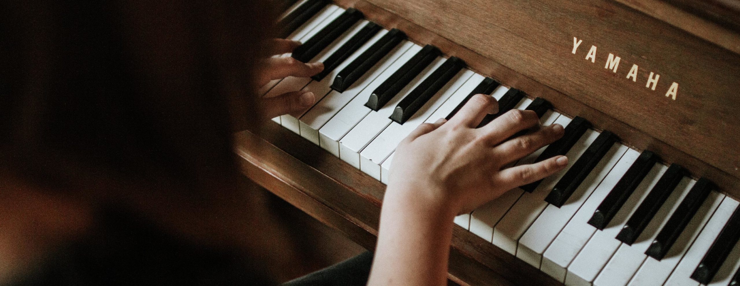 person playing a piano