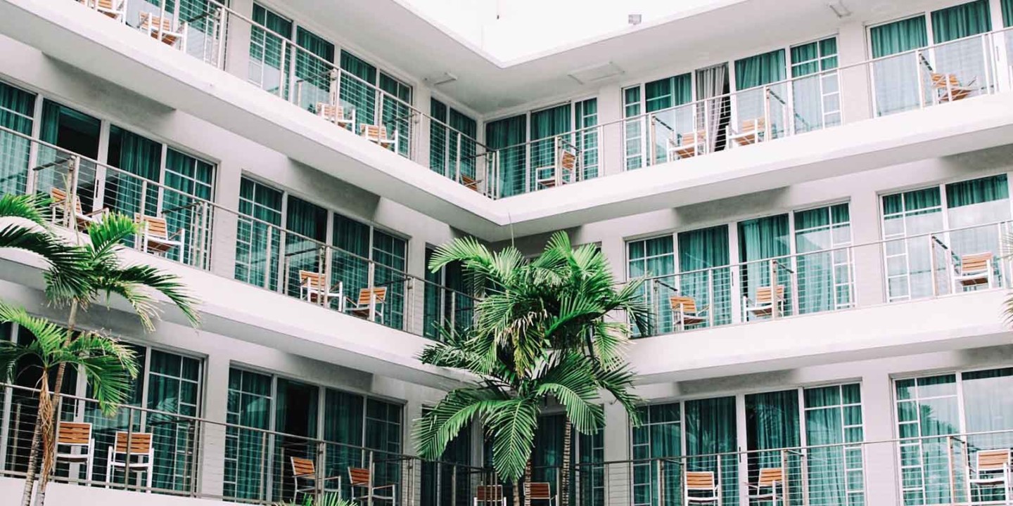 hotel balconies and palm trees