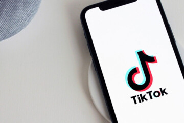 Phone screen with the TikTok logo.