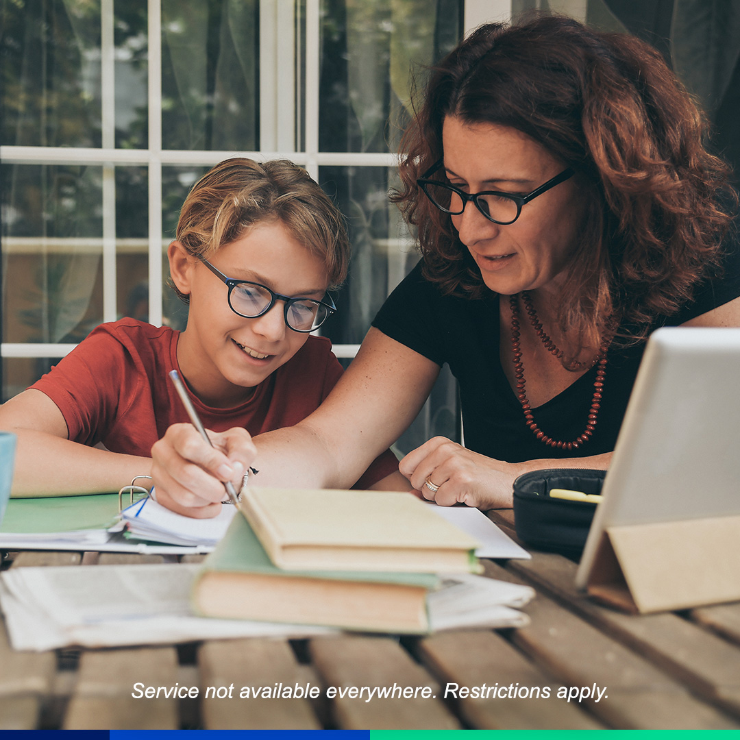 Mom with child doing homework.