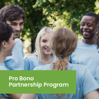 A group of volunteers gathered with Pro Bono Partnership Program text overlay.