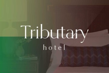 Tributary Hotel logo.