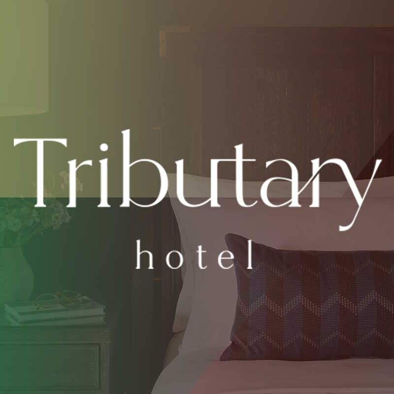 Tributary Hotel logo.