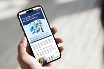 Person holding smart phone reading an article about the EAA.