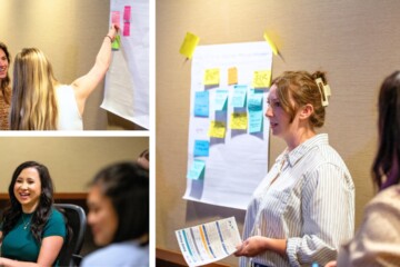 Mad Fish Digital employees plan marketing and business strategy in a conference room during their corporate retreat.