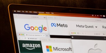 Computer screen with open tabs for Meta, Google, Amazon, Microsoft, and Apple websites.